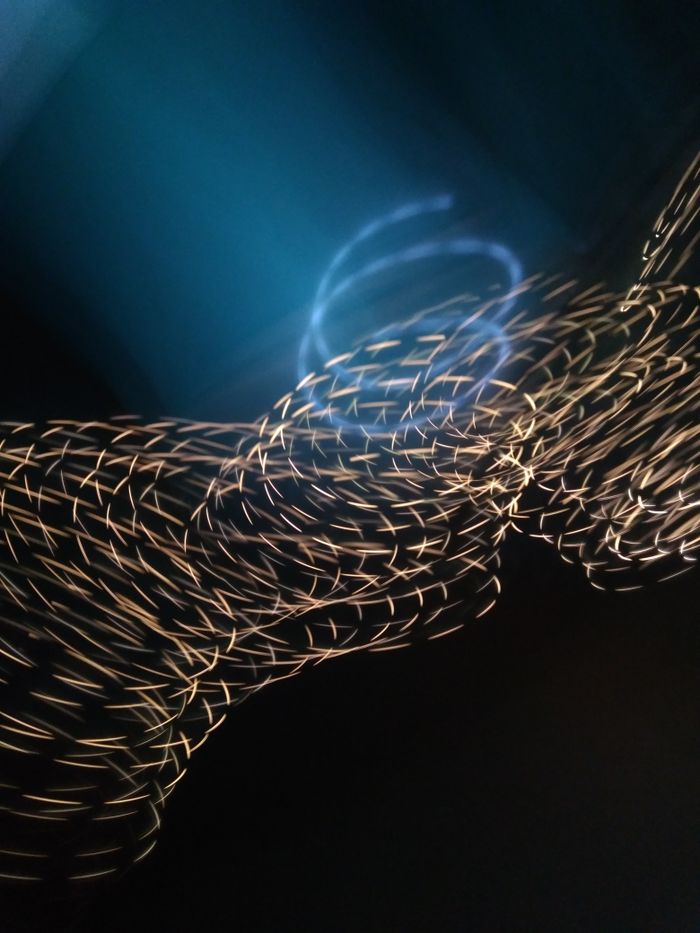 Stunning abstract light painting showcasing vibrant motion and fluidity.